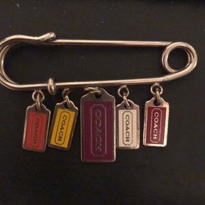 Coach kilt pin